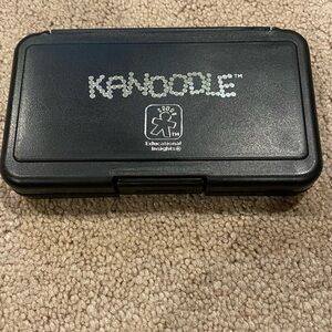Kanoodle game for ages 7+. Solve puzzles in 2D or 3D